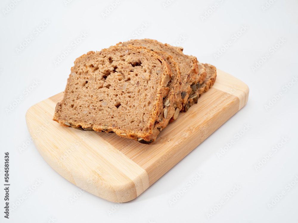 bread with pumpkin seeds on a white background. bread with pumpkin seeds on a white background.