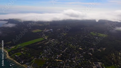 Aerial shot of Edgartown on Martha's Vineyard, Massachusetts, United States on a sunny day with the view of Chappaquiddick Island photo