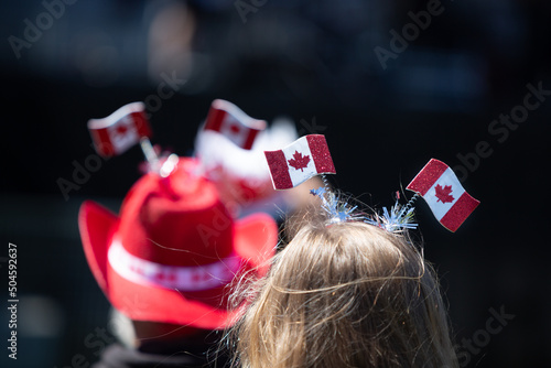 Celebrating Canada Day with a headdress made of Canada flags. photo