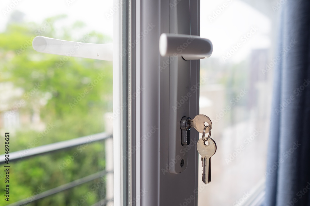 keys on the balcony door. Safety for child at home. keys on the balcony door. Safety for child at home.