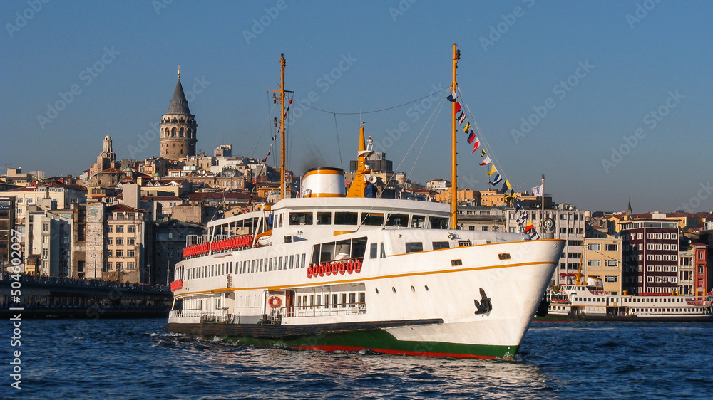 istanbul galata tower and historic passenger ferry