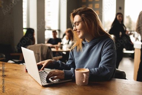 woman drinking coffee in cafe