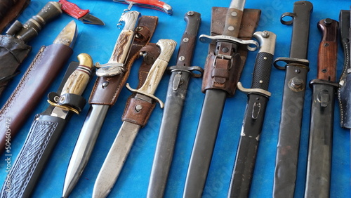 Cold steel weapons - Bayonets, dirks, daggers, stilettos,  cutlasses, hangers, collection. Cold weapons on display for sale photo