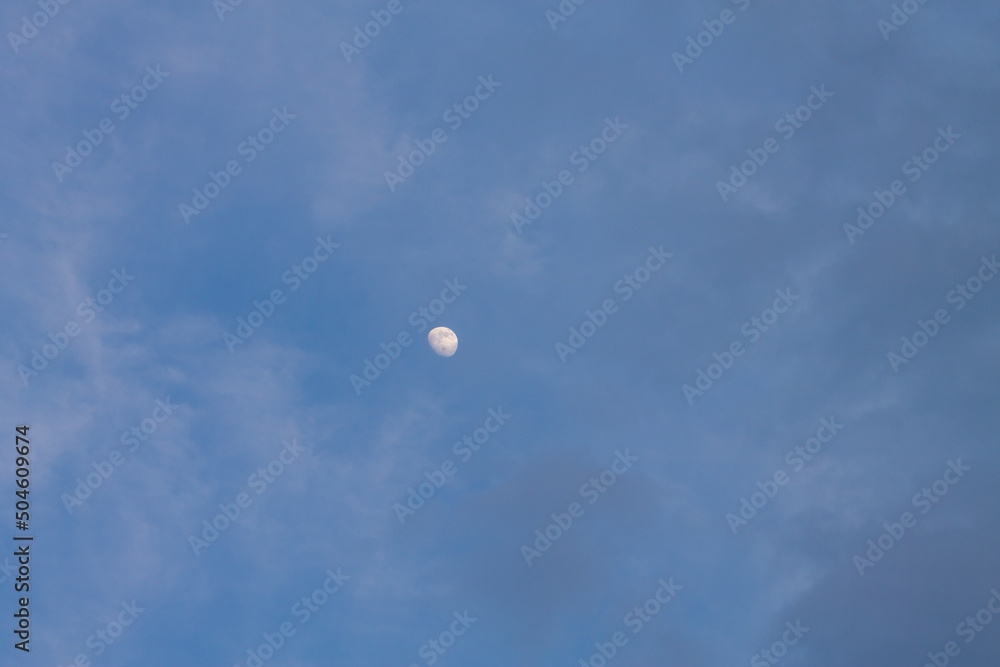 A beautiful close-up photograph of the moon (curved moon), in which we see more than half of the satellite. A beautiful close-up photograph of the moon (curved moon), in which we see more than half of the satellite.