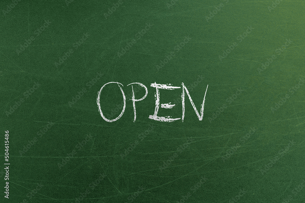 Green chalkboard with open word placard in cafe. Banners and signs templates and concepts Green chalkboard with open word placard in cafe. Banners and signs templates and concepts