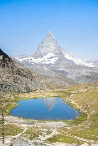 Fototapeta Naklejka Na Ścianę i Meble -  Matterhorn reflection in Riffelsee, Zermatt, Switzerland