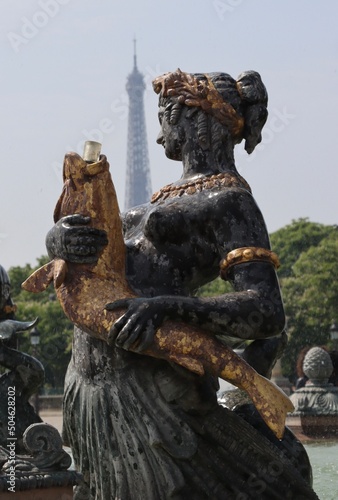 Mermaid statue in front of the Eiffel Tower 