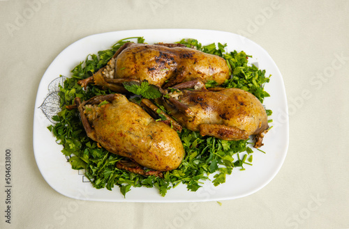 Arabic cuisine; Egyptian traditional stuffed pigeon or -Hamam Mahshi- dish