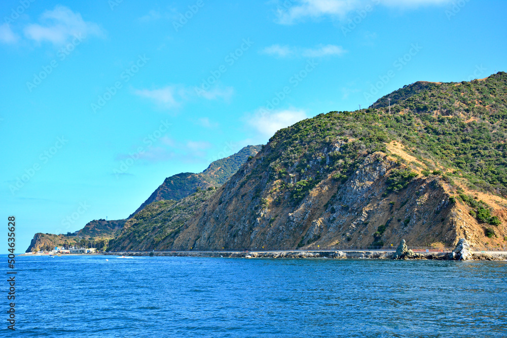 View of Santa Catalina Island coastline off the Southern California coast near Newport and Laguna Beach View of Santa Catalina Island coastline off the Southern California coast near Newport and Laguna Beach