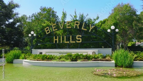 Iconic signage of Beverly Hills residential area in Los Angeles, California, USA. Drone footage of a sign along Santa Monica Boulevard at daytime. High quality 4k footage