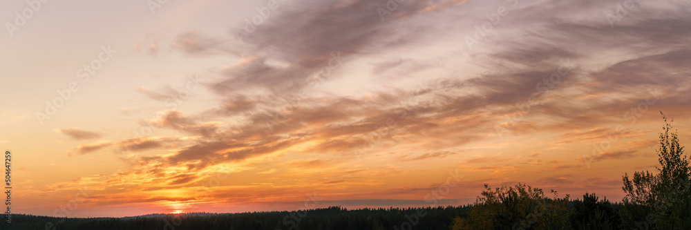 Sunset over horizon long panoramic view