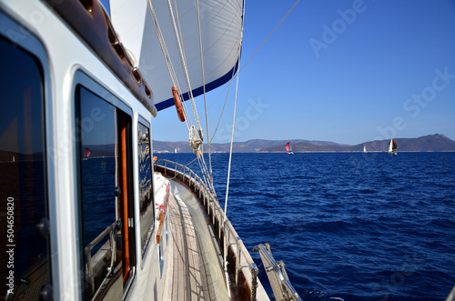 sailboat parts on sea with sunny day