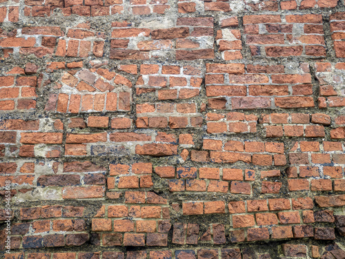 Very old brick wall, rebuilt. Background. photo