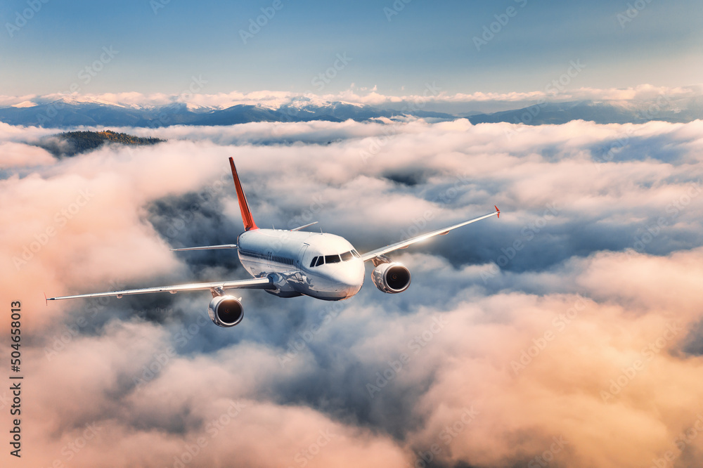 Airplane Is Flying Above The Clouds At Sunset In Summer Landscape With Airplane Is Flying Above The Clouds At Sunset In Summer Landscape With