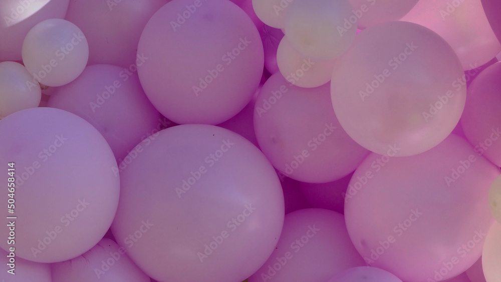 balls of blue or purple color, composition on the wall at a presentation or holiday 