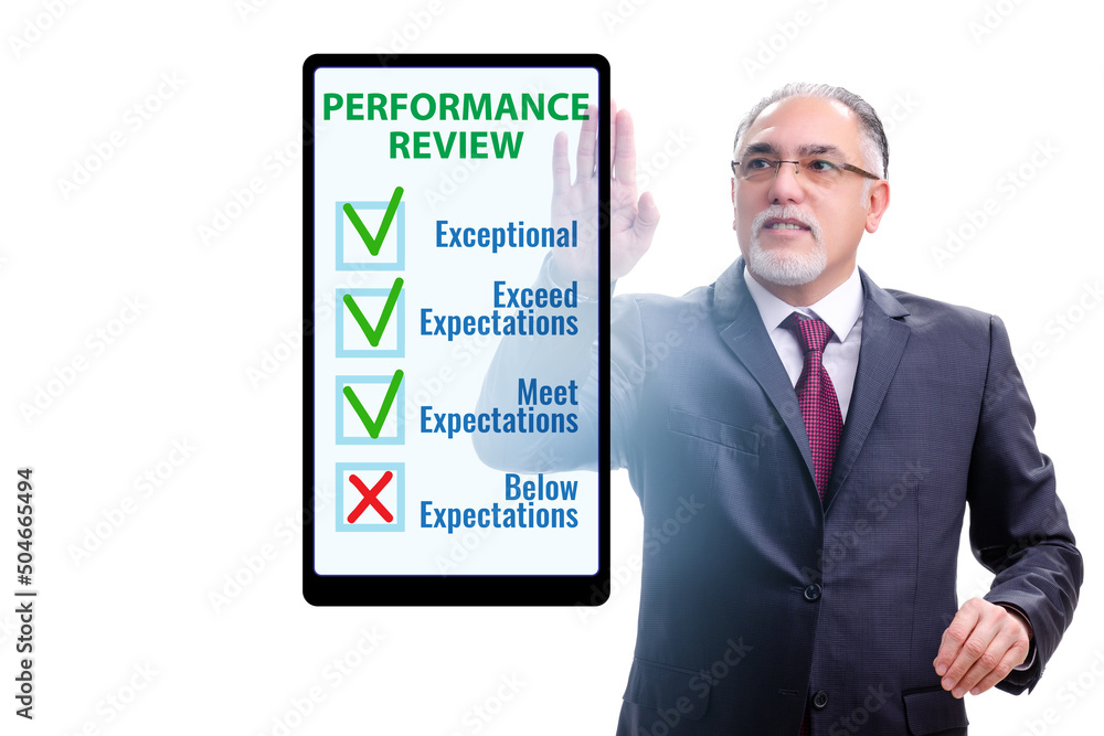 Annual performance review concept with businessman Annual performance review concept with businessman