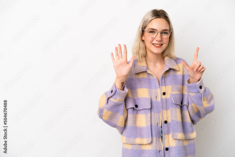 Young caucasian woman isolated on white background counting seven with fingers Young caucasian woman isolated on white background counting seven with fingers