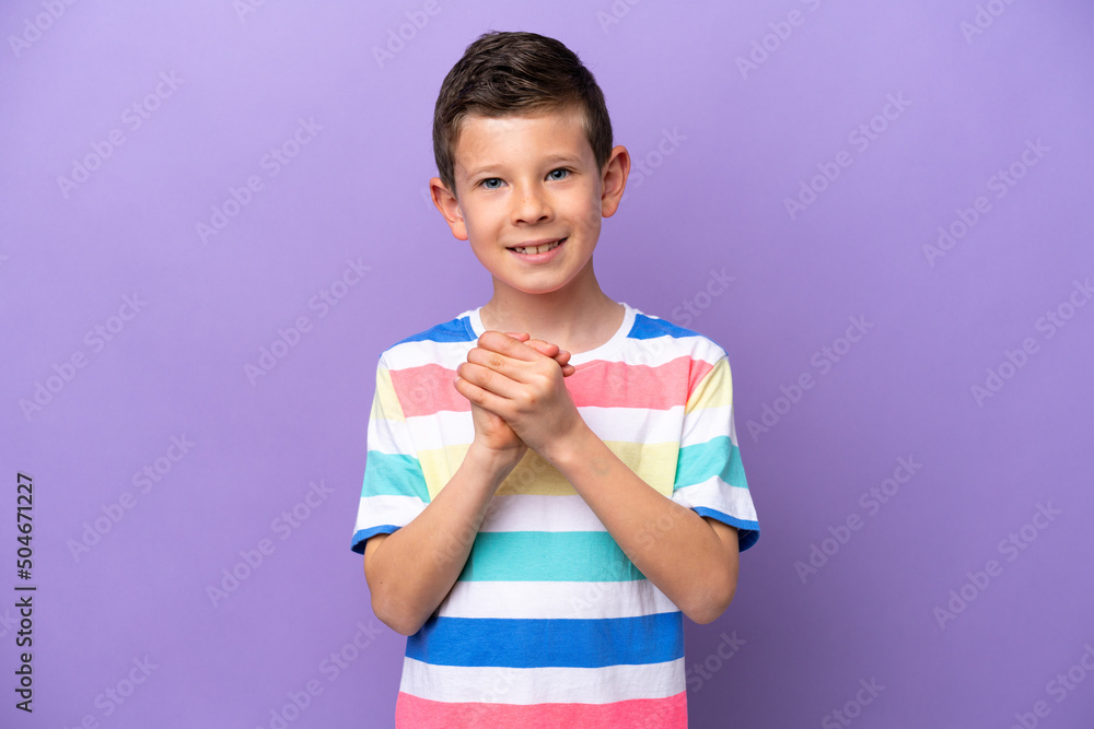 Little boy isolated on purple background laughing Little boy isolated on purple background laughing