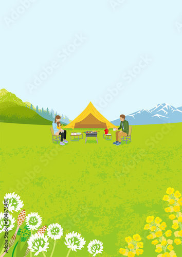 Young family enjoying camp in spring nature - Vertical