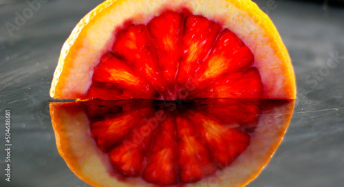 Slice of Blood Orange, Reflection on Silver Platter