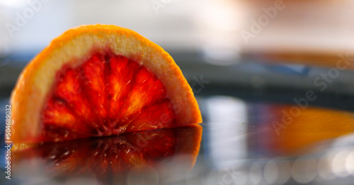 Blood Orange half-wheel, Reflection on Silver Platter