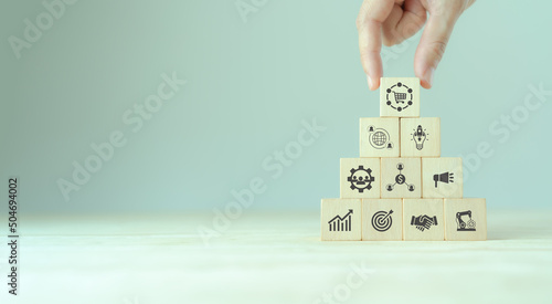 Ecosystem business and partnerships concept. Business collaboration strategies.  The value of network and solution of creating new opportunities.  Ecosystem partnerships symbol on wooden cubes. photo