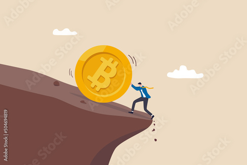 Pushing Bitcoin prevent from price falling down, cryptocurrency risk, fluctuation or volatility, crypto crisis or panic sales concept, businessman investor push Bitcoin from falling down the cliff.