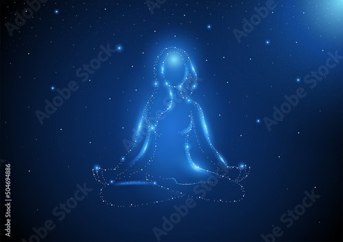Glowing stardust of female figure meditating