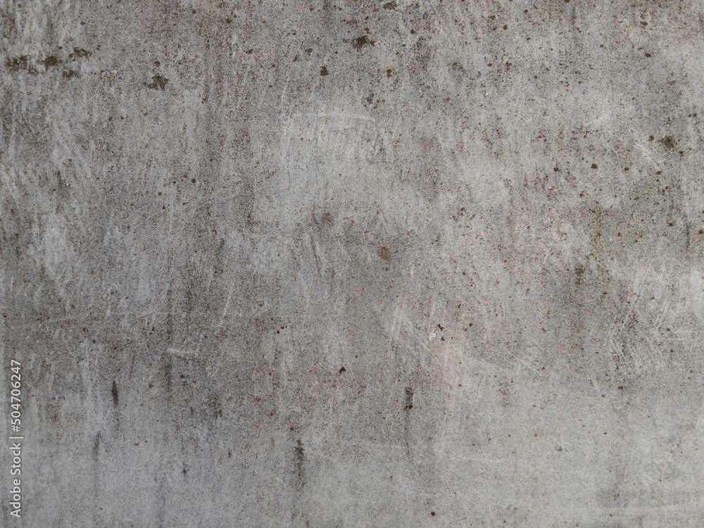 Texture of rough gray concrete surface with scratches Texture of rough gray concrete surface with scratches