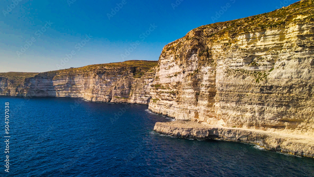 Aerial view of beautiful cliffs of Xlendi, Gozo