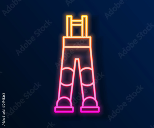 Glowing neon line Fisherman rubber pants icon isolated on black background. Vector