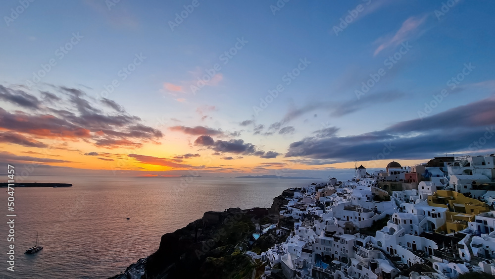 The view point out look sunset scene of the landmark view in Oia, Santorini. Image of famous village Oia located at one of Cyclades island of Santorini, South Aegean, Greece.
