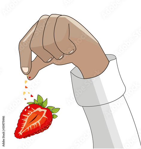 Main sucrant une demie-fraise