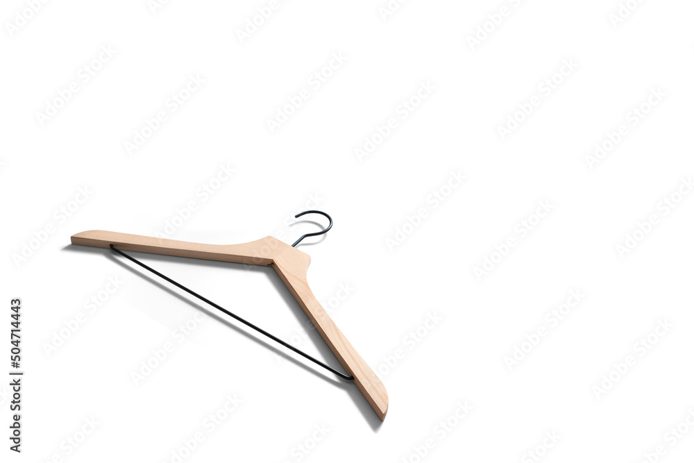 Fototapeta premium wooden hanger for clothes with black hardware isolated on white background at an angle