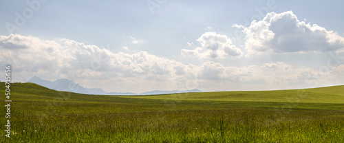 Windows bliss background,  sloping hilly green field