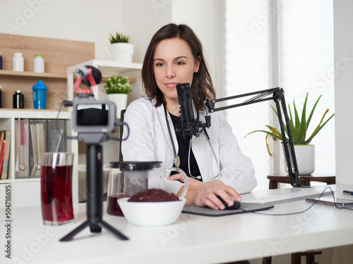 Female nutritionist talking about hibiscus drink infusion tea