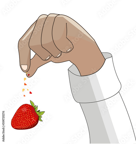Main sucrant une fraise