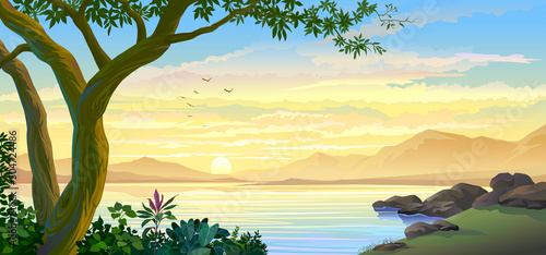 A sunset view with mountains, sky, vegetation, and a big lake.