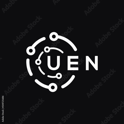 UEN technology letter logo design on black  background. UEN creative initials technology letter logo concept. UEN technology letter design. photo