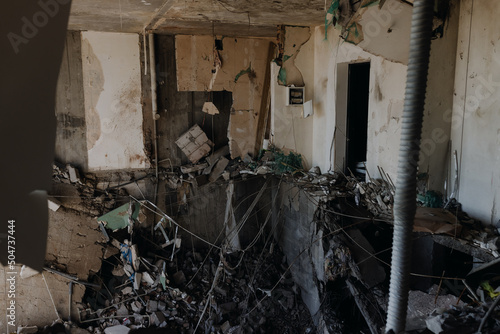  Chernihiv Ukraine 2022: Destroyed apartments after the air raid. Inside view. Ruins during Russia's war against Ukraine photo