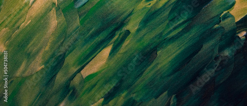 Texture of green paint with glitter. Abstract earth color background from palette knife strokes. Close-up of green shades with sparkles