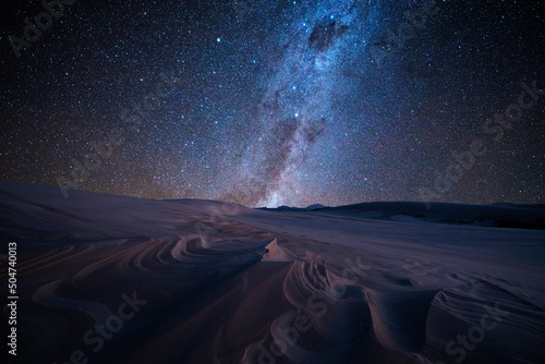 Milky way over sand dunes at Dark point, Myall Lakes National Park, Hawks Nest, NSW, Australia