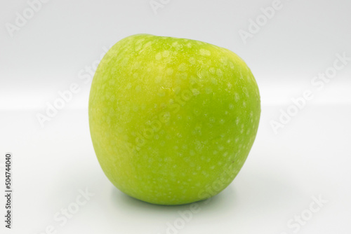 Fresh green apple on white background