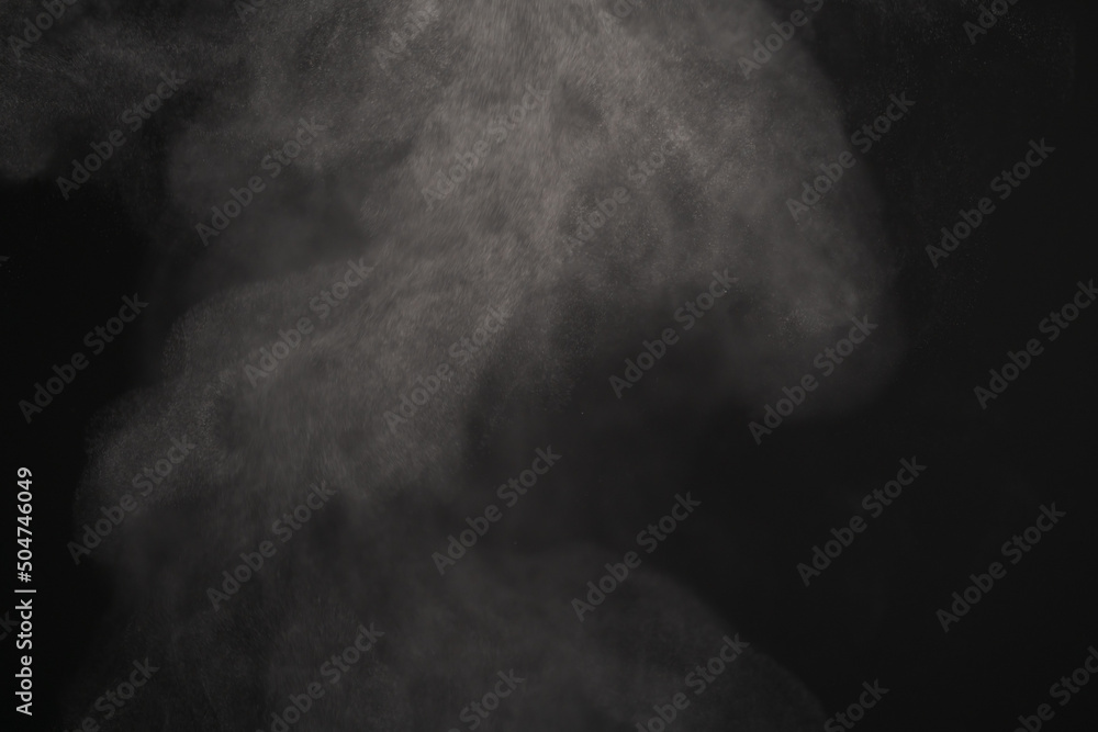 Obraz premium Closeup of water steam over black background