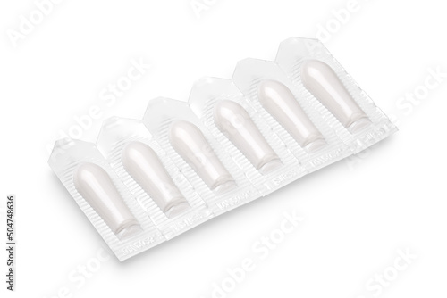 Suppository in white pack  medicine. Suppository for vaginal or anal use on gray background top view. Suppositories for treatment of hemorrhoids  fever  thrush  inflammation or constipation.