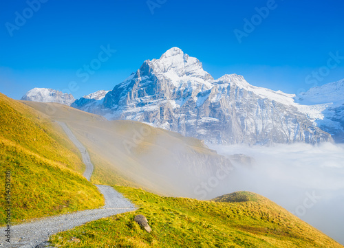 Mountains landscape above the clouds in the valley.  Mountain range and clear...