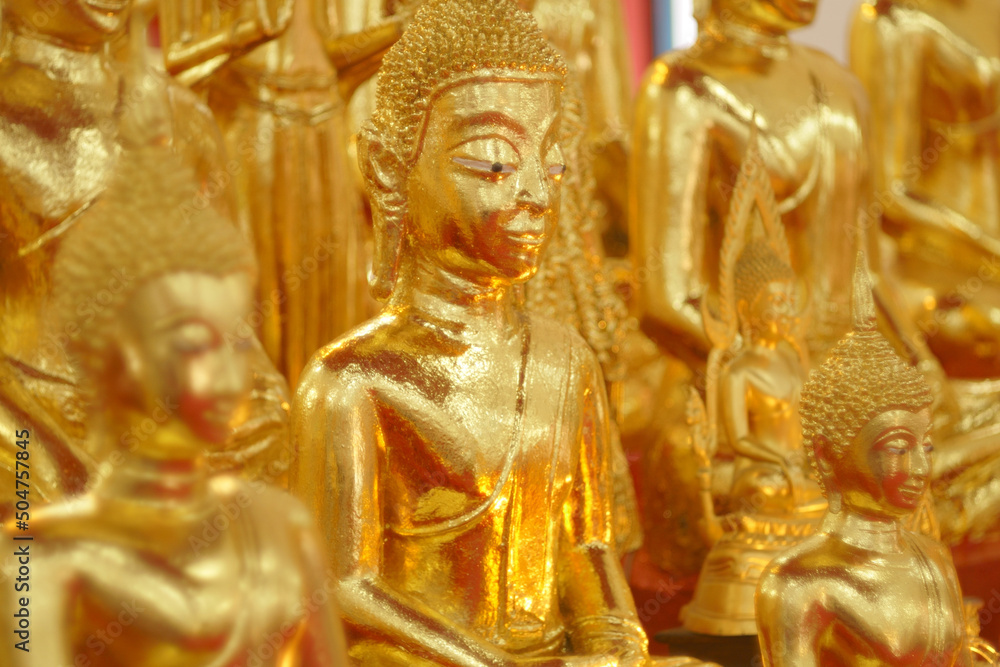 Ancient golden buddha in Wat Pichaisongkarm temple in Samutprakarn Province ,Thailand.