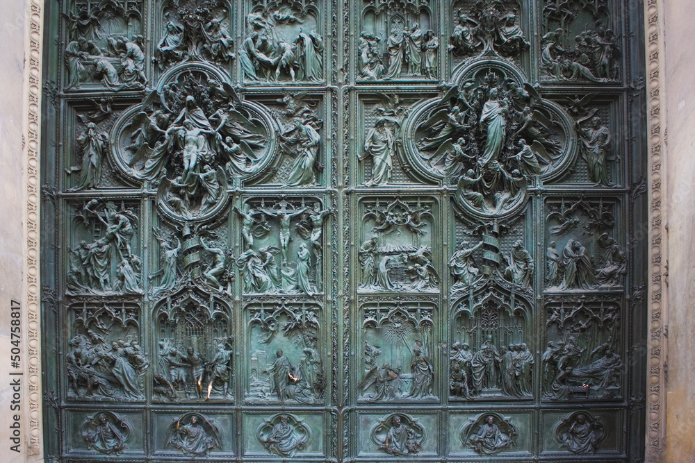 Pieta scenes on the bas relief of Milan Cathedral door in Milan Pieta scenes on the bas relief of Milan Cathedral door in Milan