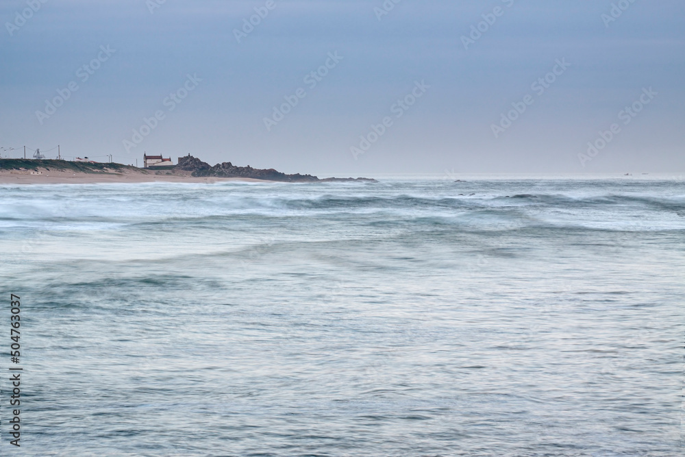 Chapel by the sea at dawn