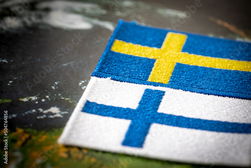flags of sweden and finland, economic and military pact and cooperation concept photo